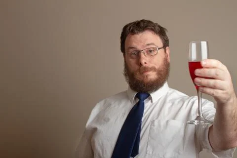 Man getting ready to drink some win Stock-Fotos