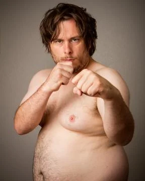 Man getting ready to get into a big fight Stock Photos
