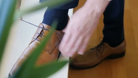 Man getting ready for a wedding, Norway, shoes turn Stock Footage 84210314
