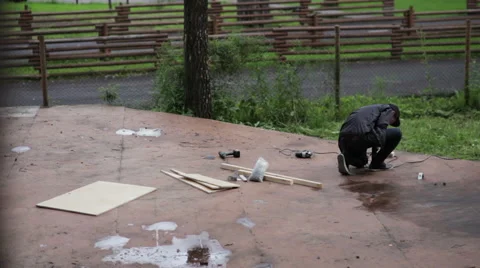 Man getting ready to work with a drill Stock Footage 59241355