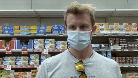 Man at Giant Grocery Store While Wearing a Mask During Covid-19 Pandemic Stock Footage 140926835