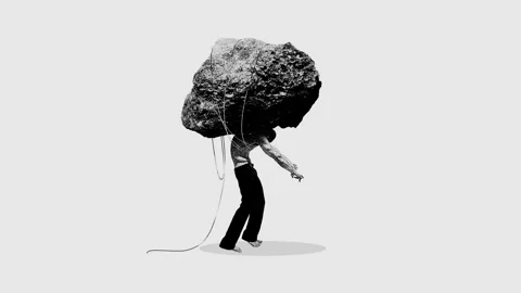 Man with giant heavy stone connected to him with rinks. Expectations, social Stock Footage 266046610