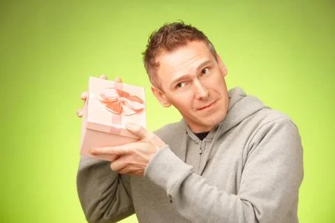 Man with gift Stock Photos