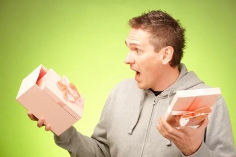 Man with gift Stock Photos