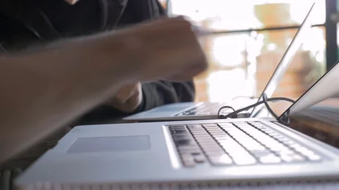 A man gives a computer lesson to an aging senior man while he agrees Stock Footage 71722599