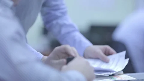 Man gives documents and securities in the signature of the director Video stock 70898510