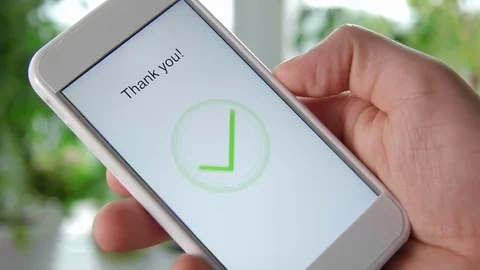 Man gives five star rating using smartphone application Stock Footage