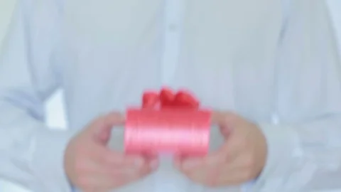 Man gives a gift in the box Stock Footage