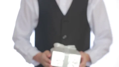 Man gives a gift in the box Stock Footage 69763473