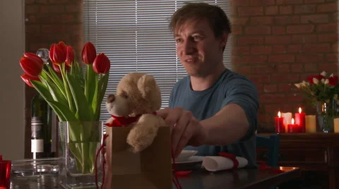 Man Gives Woman a gift on Valentines Day Stock Footage 59348288