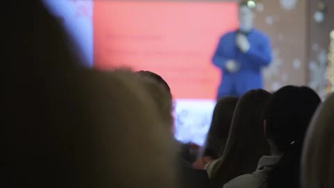 Man is giving a presentation to a group of people Stock Footage 302956026
