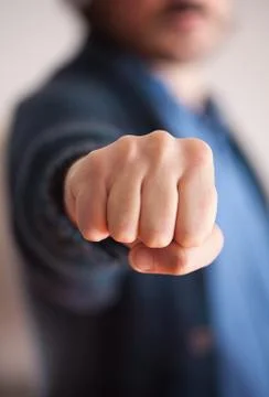 Man giving a punch Stock Photos