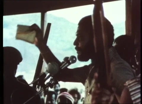 Man giving speech to people while music playing, London, United Kingdom, 1980 Stock Footage 159442962