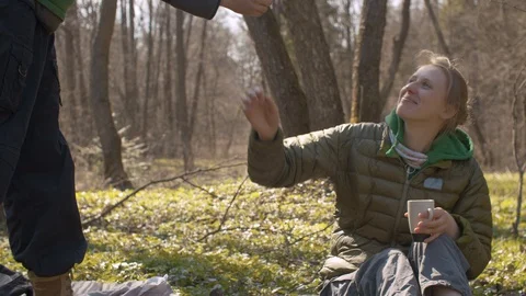 Man giving spring flower to his wife Stock Footage 129080051