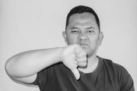 A man is giving thumbs down Stock Photos