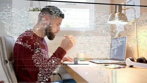 Man glancing at laptop chart, grabbing notebook and noting finance, data overlay Stock Footage 337913010
