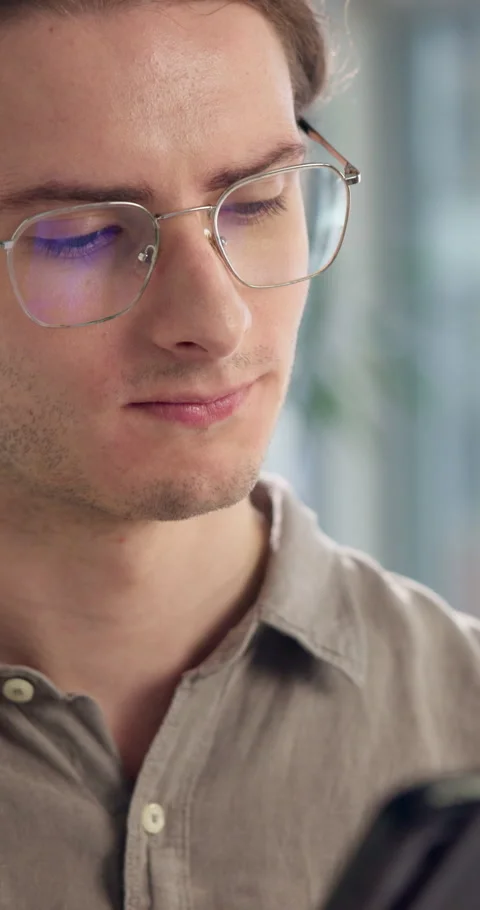 Man, glasses and tablet with reading at startup, software engineer and feedback Stock Footage 307382333