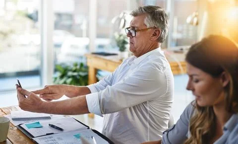 Man, glasses and vision problem with phone for contact, planning and difficulty Stock Photos