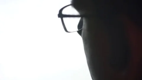 Man with glasses browsing internet Stock Footage 81146038