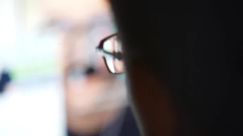 Man with glasses browsing internet Stock Footage 81146039