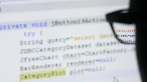 Man with glasses browsing internet Stock Footage 81146065