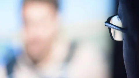 Man with glasses browsing internet Stock Footage 81146079