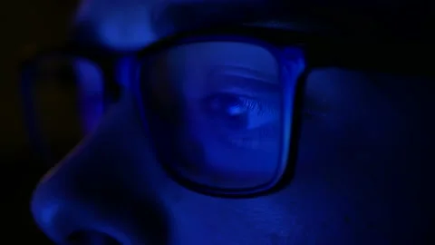 Man with glasses browsing the Internet late at night, Internet Addiction 4k Stock Footage 134565726
