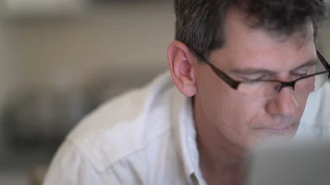 Man in glasses at computer Stock Footage 201501757