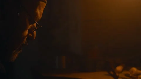 Man with glasses focused on work Stock Footage 275442388