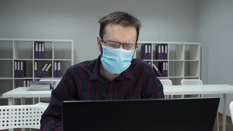 Man glasses fogged up because he wearing a medical mask Stock Footage 149275297