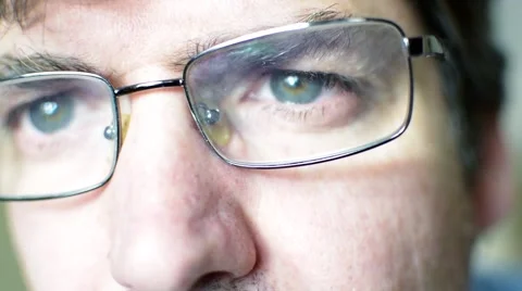 Man with glasses looking close up Stock Footage 62023454