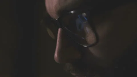 Man in glasses looking at the computer screen Stock Footage 106779844