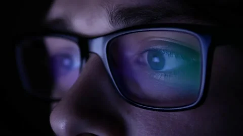 Man in glasses at night looking for a solution on the Internet. Stock Footage 134566452