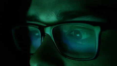Man in glasses at night looking for a solution on the Internet. Stock Footage 134566480