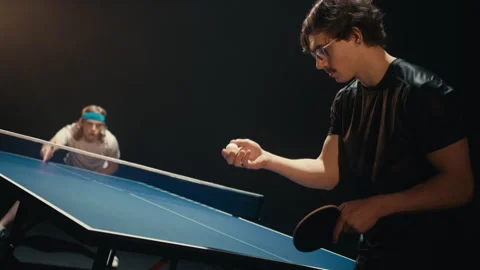 Man with glasses serving the ball Stock Footage 279241418