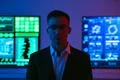 The man in glasses standing on screens background Photo