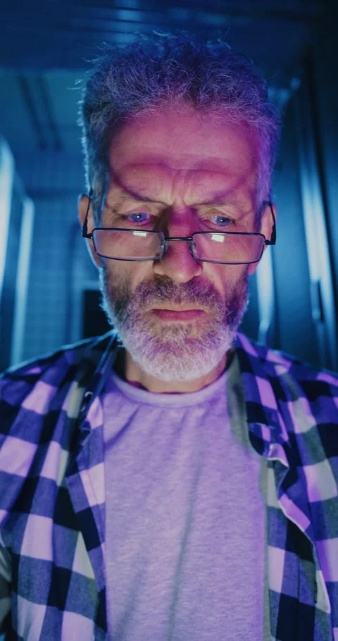 Man With Glasses Staring at Object Stock Footage 276489759