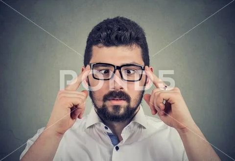Man in glasses with strabismus Stock Photos