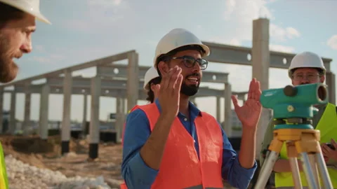 Man with glasses talking with engineers about a construction project use optical Stock Footage 276416235