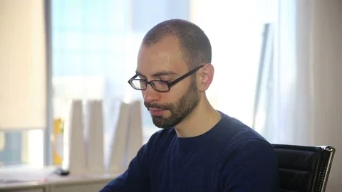 The man in glasses talking phone Stock Footage 69986567