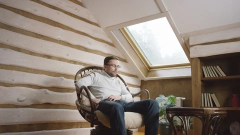 Man in glasses talks in video chat on smartphone Stock Footage 100339021