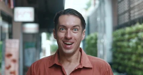 Man glasses unexpectedly achieves win, spontaneous moment success. surprise joy Stock Footage 268668109