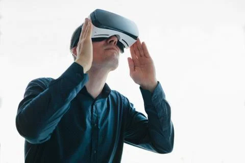 The man with glasses of virtual reality. Future technology concept. Modern Stock Photos