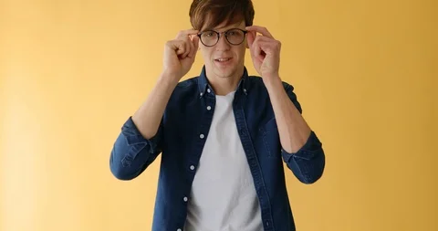 A man with glasses for vision, a nerd guy with glasses Video stock 125278388