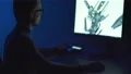 The man in glasses working with a 3d graphic. evening night time 4k or 4k+ Resolution