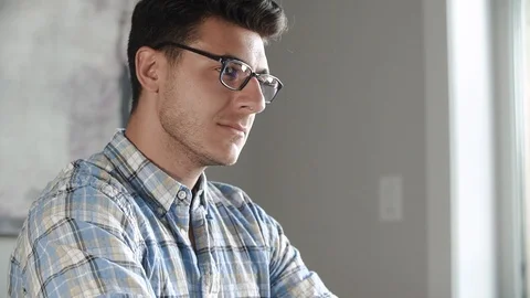 Man With Glasses Working On Laptop Computer Stock Footage 100577358