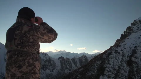 Man glassing on mountain. Stock Footage 49843953