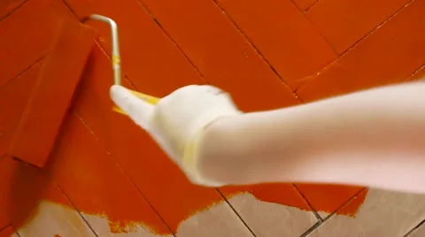 Man gloves paint roller floor, close-up Video stock 65417776