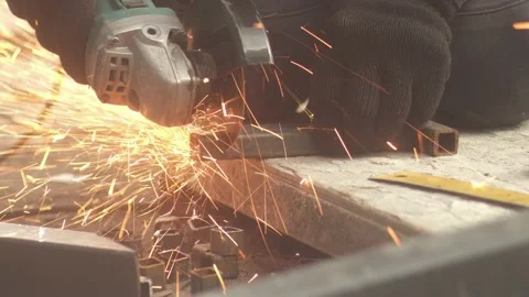 Man in gloves works with grinder tool. Closeup scene Stock Footage 165688861