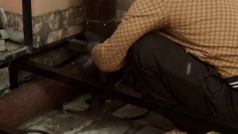 A man in gloves works with a welding machine Stock-Footage 309972680